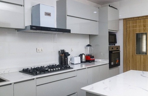 Ofin Apartment | Luxury Brown-Themed Apartment with Balcony Views & Comfort