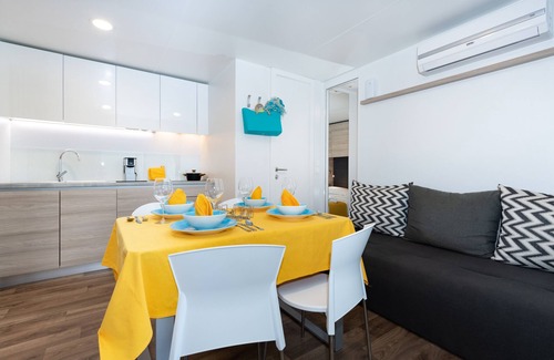 Reschigliano RV Rental | Elegant Camp Retreat at Union Lido with Ocean View & Spa