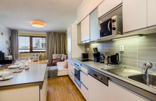 Rohansky ostrov Apartment | Prime 4-Star Apartment with Garage Parking & Pet-Friendly