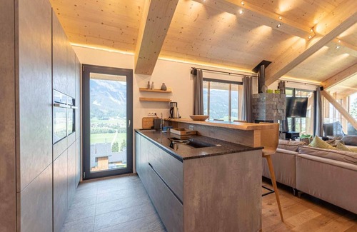 Haus im Ennstal Ski Chalet | Inviting Chalet with Pool & Sauna Steps from Ski Lift