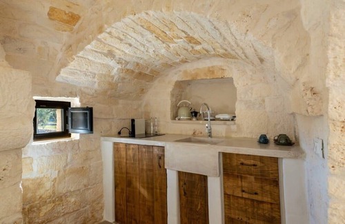 Ostuni Villa | Elegant Borgo Cinera: Poolside Relaxation & Spa Awaits