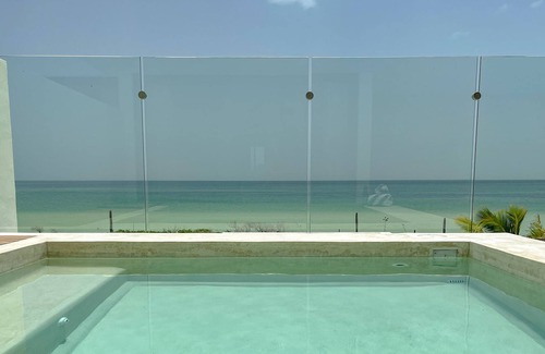 Dzemul Apartment | Luxury Condo Ocean Front - Family Friendly