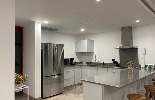Telchac Puerto Condo | Exquisite Condo with Private Jacuzzi and Scenic Flamingo Views