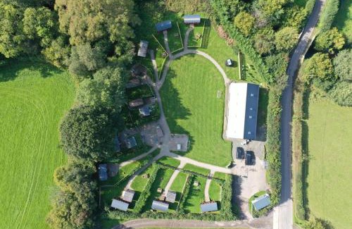 Longtown Apartment | Cozy Carriage Retreat with Private Hot Tub & Pet-Friendly