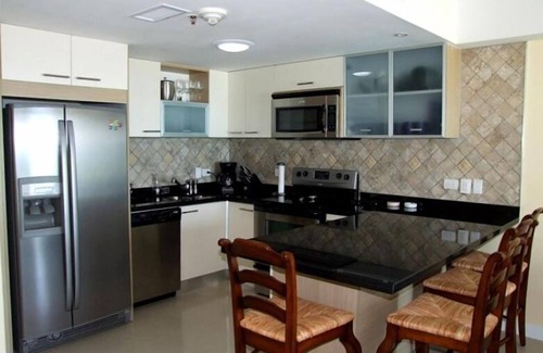Eagle Beach Condo | Elegant Eagle Beach Front Penthouse with Private Roof Terrace