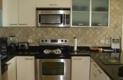 Eagle Beach Condo | Elegant Eagle Beach Front Penthouse with Private Roof Terrace