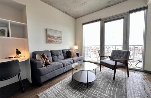 Lower East Side Apartment | Modern East Side Studio with Gym and Balcony Access