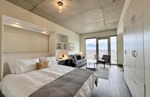 Lower East Side Apartment | Modern East Side Studio with Gym and Balcony Access
