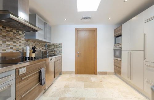 Playa Mujeres Apartment | Exclusive 3BR Apartment with Pool and Family Amenities