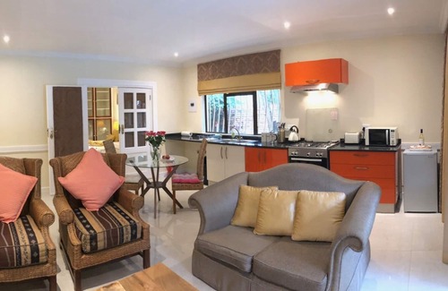 Bedfordview Apartment | Elegant Executive Apartment with Pool and Garden Views