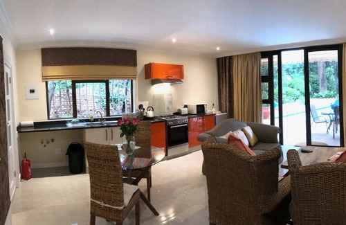 Bedfordview Apartment | Elegant Executive Apartment with Pool and Garden Views