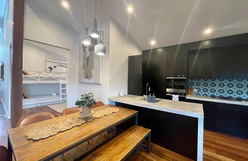 Patonga House | Beachfront Family Retreat with Heated Pool & Ocean Views
