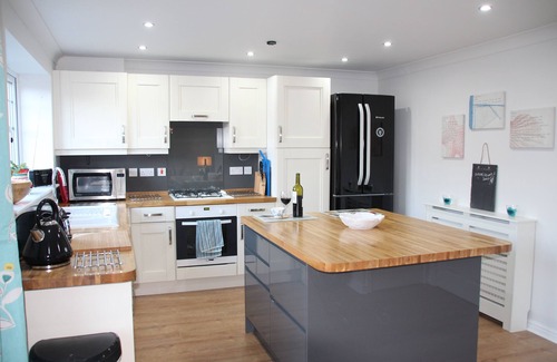 Seahouses House | Family Beach Retreat with Ocean View & Hot Tub, Rated 9.8