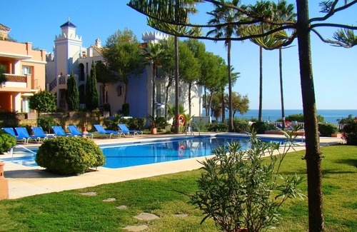 Bahia de Casares Apartment | luxury frontline beach ground floor apartment with seaviews, internet, 4 pools