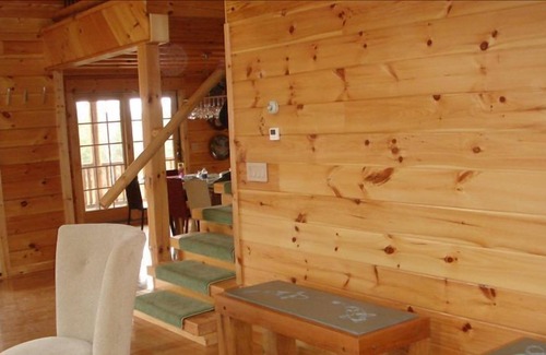 Galilee Cabin | Elegant Galilee Log Cabin with Pool & Ocean Views in PA
