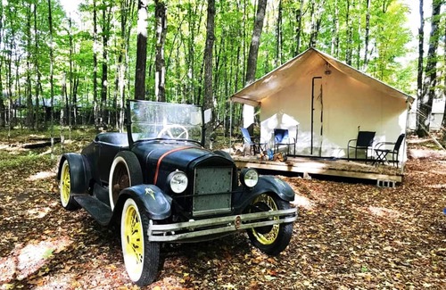 Phelps Apartment | Discover 1920's John Dillinger's Glamping Tent & Spa Oasis