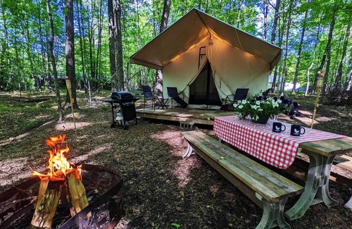 Phelps Apartment | Discover 1920's John Dillinger's Glamping Tent & Spa Oasis
