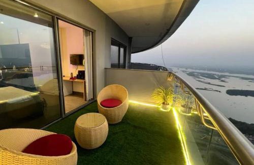 Noida Apartment | Stunning Heights: City & River Views with Pool Access