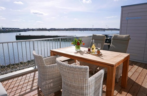 Olpenitz Apartment | Modern Duplex with Water View, Terrace & Spa Amenities
