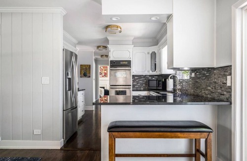 Fox Valley House | Exquisite Home with Heated Saltwater Pool & Ocean Views