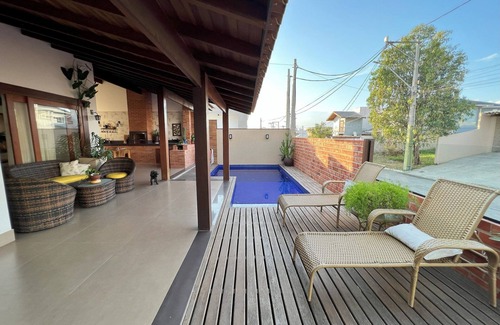 Sao Pedro da Aldeia Condo | Indulge in a Poolside Retreat at Luxury Condominium