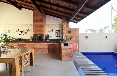 Sao Pedro da Aldeia Condo | Indulge in a Poolside Retreat at Luxury Condominium