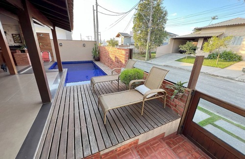 Sao Pedro da Aldeia Condo | Indulge in a Poolside Retreat at Luxury Condominium