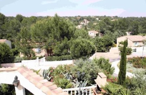 Garrigues House | Elegant Retreat with Garden, Pool & Golf Course Access