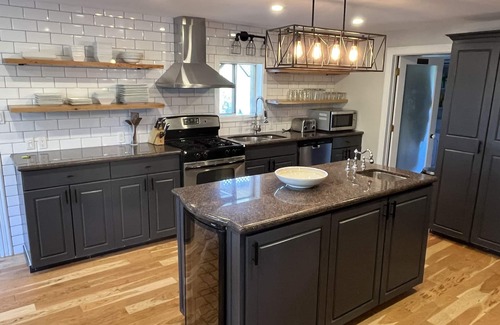Saint-Anicet Cottage | Elegant Lake House with Hot Tub & Spa Near the Beach