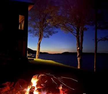 Newport Center Apartment | Luxury Lake Memphremagog Loft - 2 Bedrooms Water Views Firepit & Dock near Jay Peak