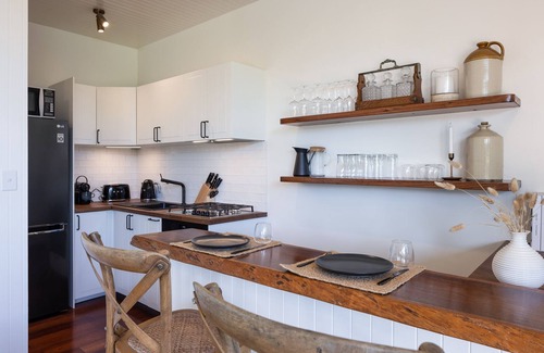 Coomba Bay House | Elegant Lakefront Suite with Pet-Friendly Amenities