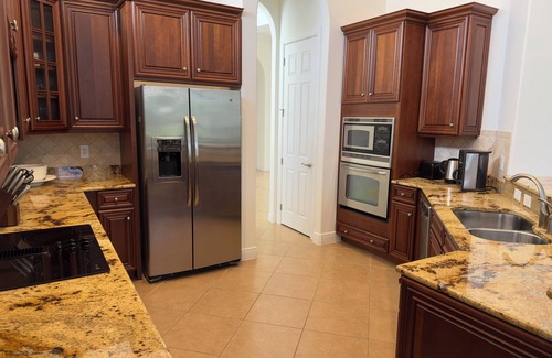 Naples Villa | Lakefront Villa Retreat with Pool and Spa Amenities