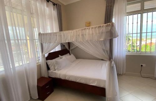 Kampala Apartment | Elegant Lakeview Penthouse Retreat in Munyonyo