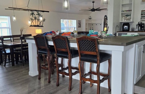 Indian Harbor Estates House | Waterfront Home with Pool and Boat Dockage for Families