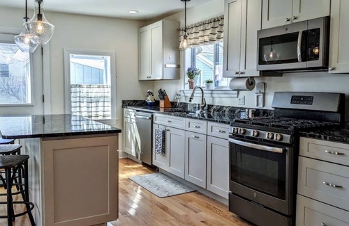 Eastport House | Elegant Escape: Walk to Town with Ocean View Amenities