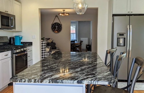 Eastport House | Elegant Escape: Walk to Town with Ocean View Amenities