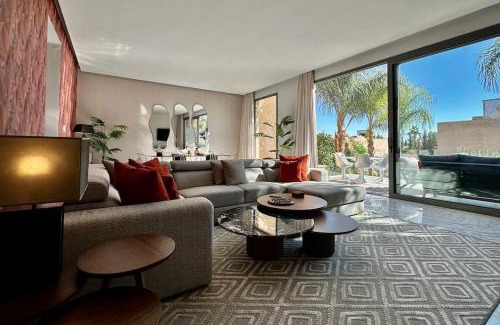 Annakhil Apartment | Experience Elegance with Poolside Ocean Views