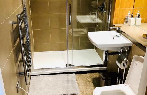 Moffat Apartment | Elegant Lodge Excel London: Where Comfort Meets Style