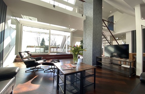 Bochold House | Elegant Two-Floor Loft with Sauna, Terrace & Pet-Friendly Stay