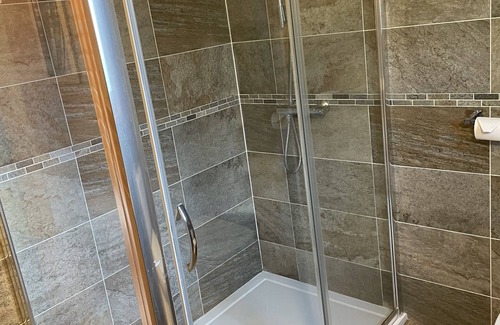Kenwick Cabin | Scenic Log Cabin with Hot Tub Overlooking Kenwick Golf Course
