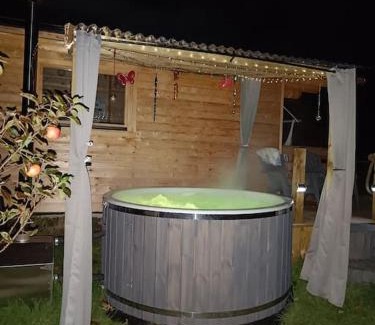 Moville Ski Chalet | Cozy Log Cabin Retreat with Inviting Wood-Fired Hot Tub