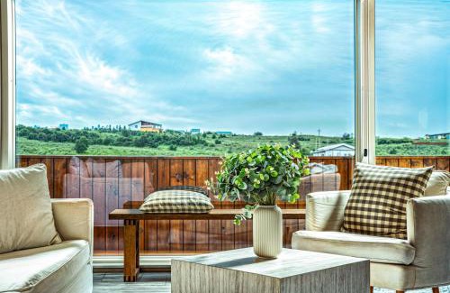 Selfoss House | Experience Venture Vacations: Log Home with Hot Tub Retreat