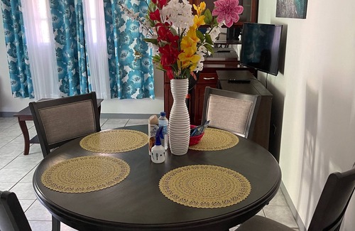 Saint George Parish House | Elegant Master Suite Apartment with Ocean View in Roseau