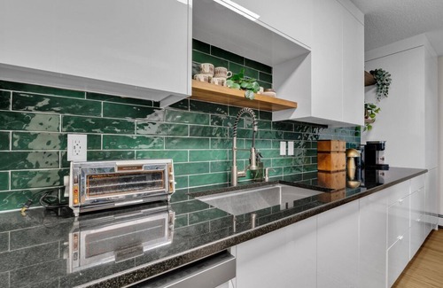 Southeast Calgary Condo | Luxury Midcentury Modern Suite - Remote Worker Focused