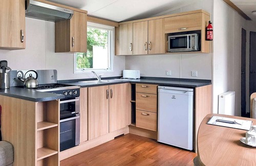 Saint Ann's Chapel House | Modern 12ft-Wide Caravan with Pool & Lake View Amenities