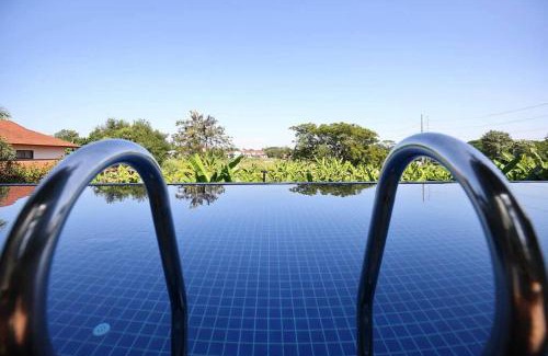 Su Thep Apartment | Stylish Garden View Apartment with Pool & Oceanfront Access