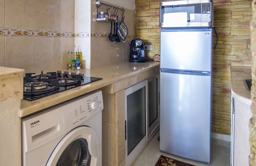 Centro Havana Apartment | Oceanfront Neptuno Apartment with Spa & Breakfast Included