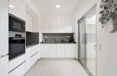 Lagos Condo | Stylish 2-Bedroom Apartment with Ocean View and Parking