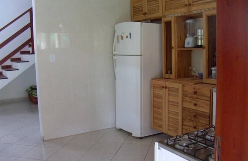Itamambuca House | Elegant 5-Bedroom Condominium with Pool and Spa Amenities