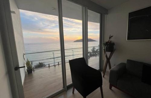 Zona Dorada Apartment | Oceanfront Relaxation at Camino al Mar with Heated Pool
